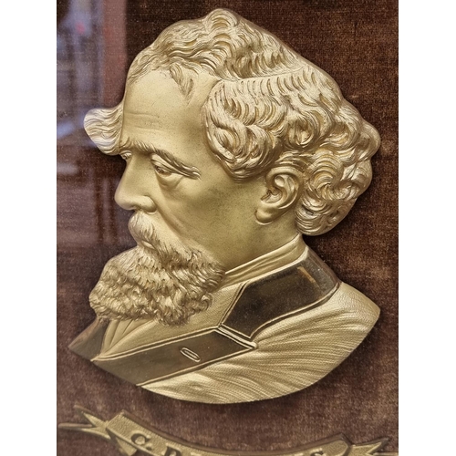 1284 - A gilt metal plaque of Charles Dickens, finely detailed, framed and glazed, the whole 40.5 x 35.5cm.... 