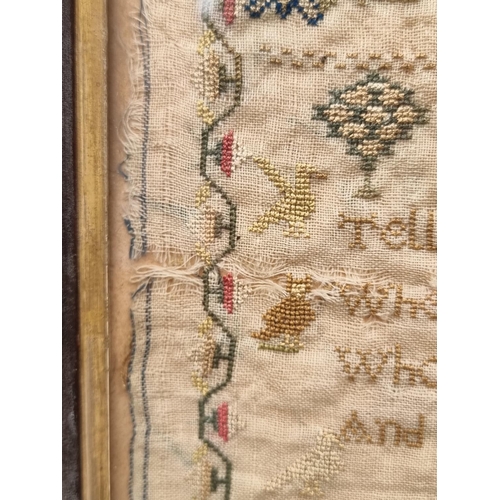 1297 - A 19th century needlework sampler, by 'Emma Wheeler', 32 x 32cm.