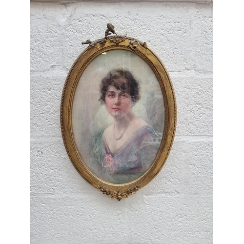 1315 - Dorothy M Morgan, head and shoulders portrait of a young lady, signed, watercolour, 48 x 33cm oval.... 