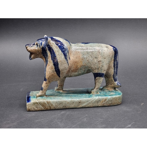 1353 - An unusual steatite lion, possibly ancient Egyptian, 18.5cm long.