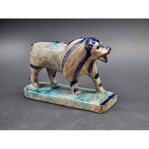 1353 - An unusual steatite lion, possibly ancient Egyptian, 18.5cm long.