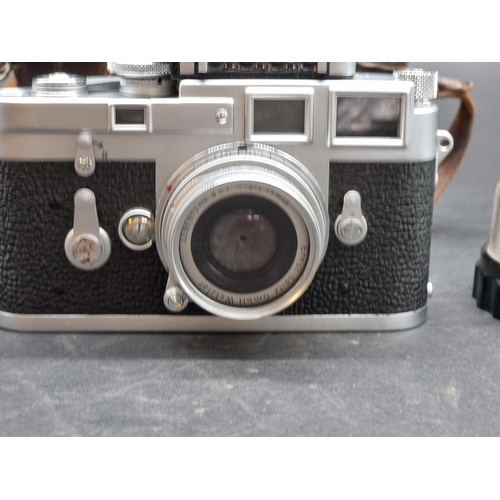 1360 - Cameras: a Leica M3, serial No.898917, in original leather case, with Leica Meter MC, Elmar f=5cm 1:... 