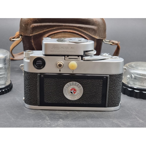 1360 - Cameras: a Leica M3, serial No.898917, in original leather case, with Leica Meter MC, Elmar f=5cm 1:... 