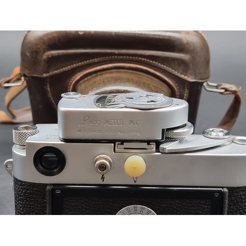 1360 - Cameras: a Leica M3, serial No.898917, in original leather case, with Leica Meter MC, Elmar f=5cm 1:... 