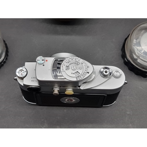 1360 - Cameras: a Leica M3, serial No.898917, in original leather case, with Leica Meter MC, Elmar f=5cm 1:... 