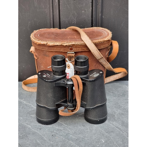 1386 - A pair of Mariner 7x50 binoculars, in leather case.