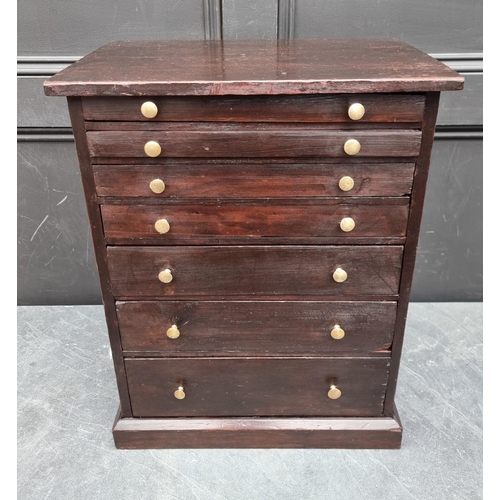 1006 - An old stained pine collectors' type chest, 56.5cm high x 44.5cm wide.