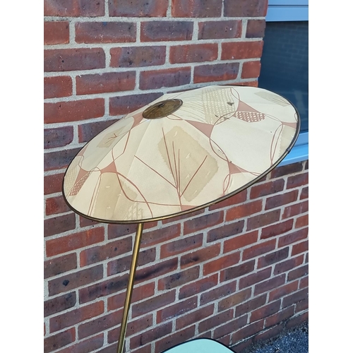 1033 - A mid-century brass lamp table, probably Italian, with original shade, approx. 155cm high.... 