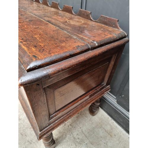 1098 - An 18th century oak two drawer side table, 131cm wide, (alterations).