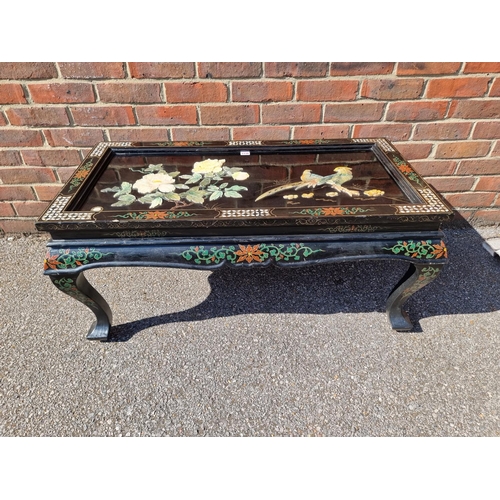 1116 - A Chinese black lacquer and soapstone rectangular low occasional table, 106cm wide.