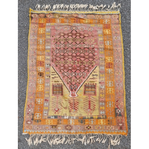 1126 - A flatweave rug, having floral and geometric borders 200 x 136cm; together with a Kelim rug; and a s... 