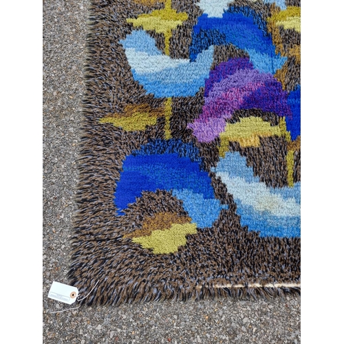 1128 - A Swedish Rya rug, 152 x 112cm.