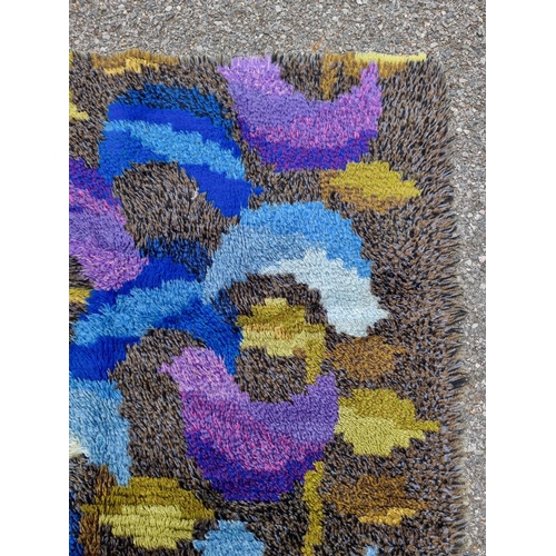 1128 - A Swedish Rya rug, 152 x 112cm.