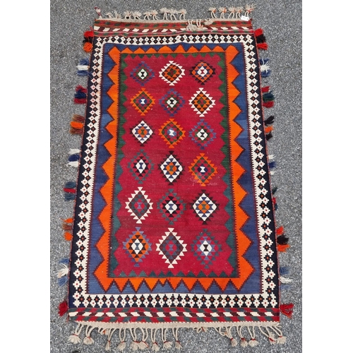 1134 - A Tribal Aztec rug, having allover geometric design, 270 x 158cm.