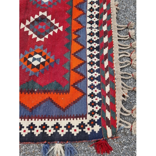 1134 - A Tribal Aztec rug, having allover geometric design, 270 x 158cm.