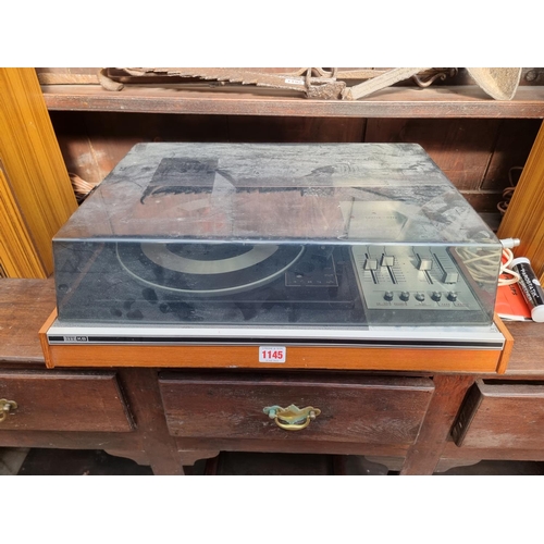 1145 - Hi-Fi Equipment: an ITT KB Twelve-Fifty record deck, with BSR C141 turntable, with instructions; tog... 