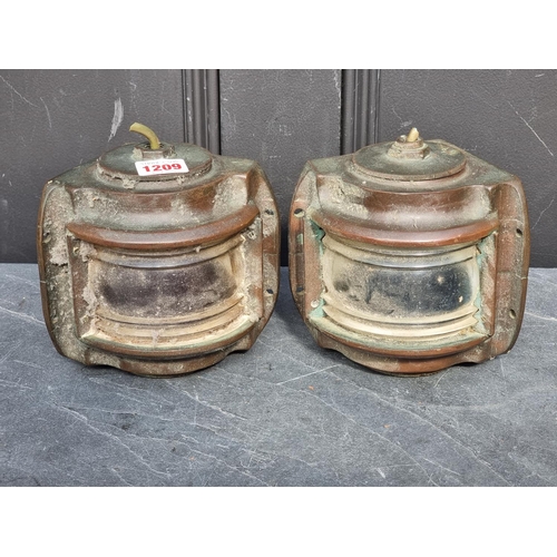 1209 - A small pair of bronze ship's corner lanterns, 15cm high.