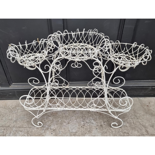 1242 - A 19th century white painted wirework plant stand, 79cm high x 92cm wide.