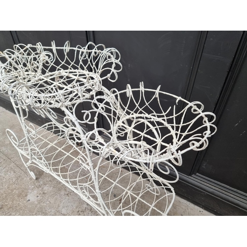 1242 - A 19th century white painted wirework plant stand, 79cm high x 92cm wide.