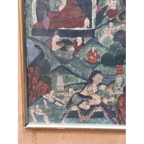 1258 - An antique Sino-Tibetan Thangka, 72 x 50.5cm.