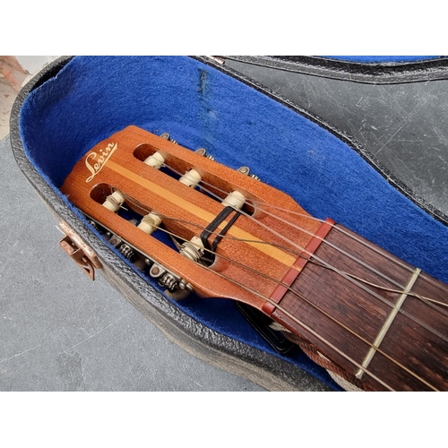 1643 - A Levin LG-20 acoustic guitar, in hard case.