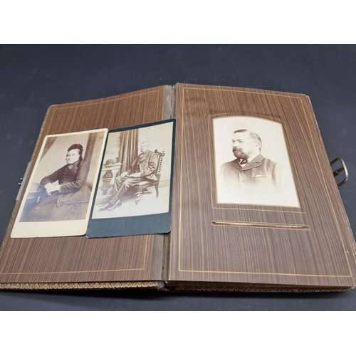 104 - CARTE DE VISITE ALBUMS: two 19thc cdv albums, both filled, padded leather covers with metallic closu... 