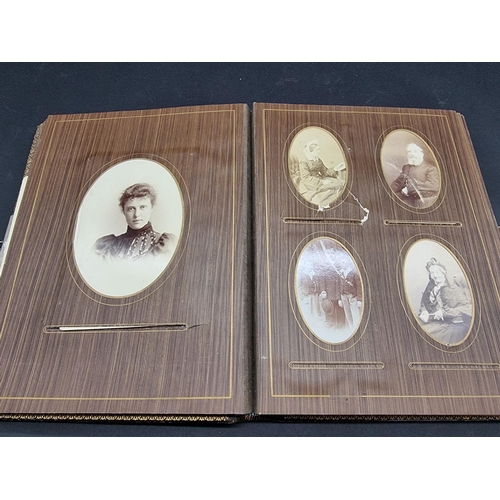 104 - CARTE DE VISITE ALBUMS: two 19thc cdv albums, both filled, padded leather covers with metallic closu... 