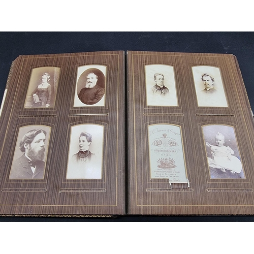 104 - CARTE DE VISITE ALBUMS: two 19thc cdv albums, both filled, padded leather covers with metallic closu... 