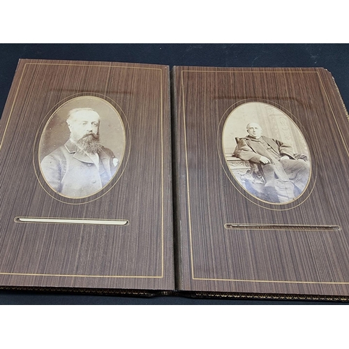 104 - CARTE DE VISITE ALBUMS: two 19thc cdv albums, both filled, padded leather covers with metallic closu... 