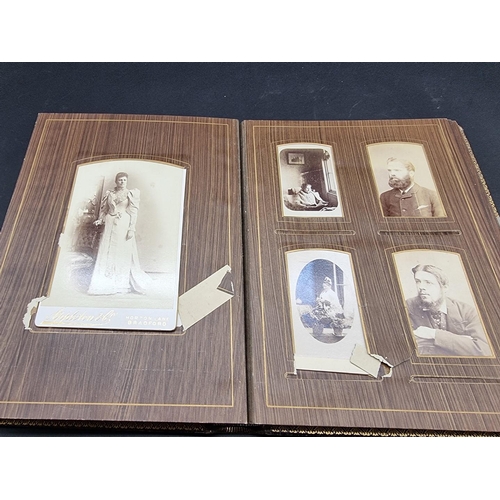 104 - CARTE DE VISITE ALBUMS: two 19thc cdv albums, both filled, padded leather covers with metallic closu... 