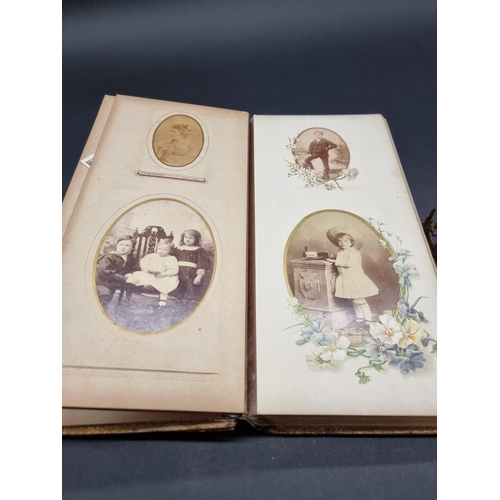 104 - CARTE DE VISITE ALBUMS: two 19thc cdv albums, both filled, padded leather covers with metallic closu... 