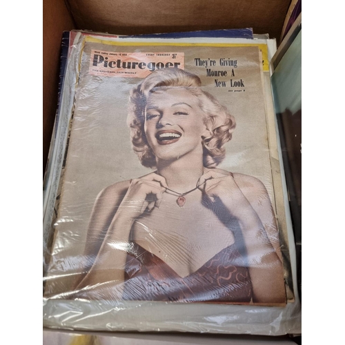 199 - MARILYN MONROE: carton of related books, stamps, photographs, prints and other memorabilia. (Bo... 