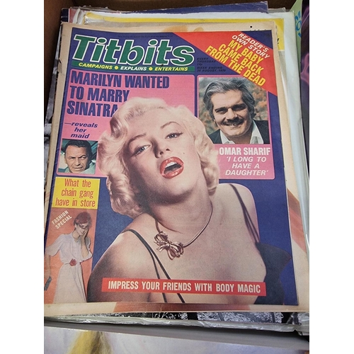 199 - MARILYN MONROE: carton of related books, stamps, photographs, prints and other memorabilia. (Bo... 