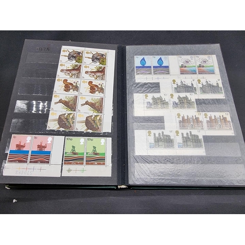 217 - STAMPS: mainly QEII contained in 4 stockbooks. (Tray)