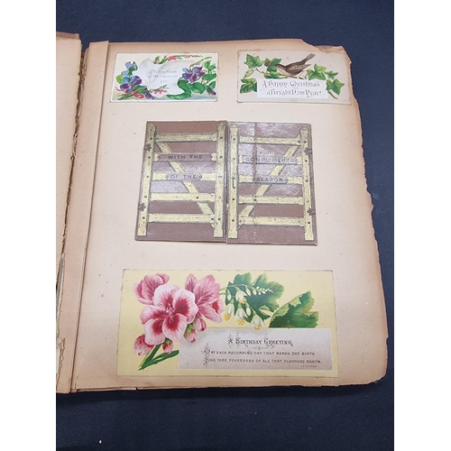 223 - SCRAP ALBUMS: three albums of greetings cards and chromolithographic scraps, late 19th-early 20... 