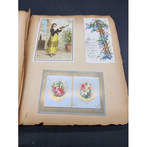 223 - SCRAP ALBUMS: three albums of greetings cards and chromolithographic scraps, late 19th-early 20... 