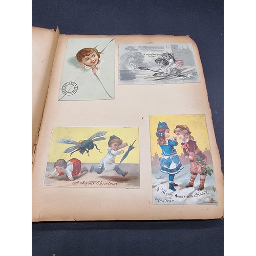 223 - SCRAP ALBUMS: three albums of greetings cards and chromolithographic scraps, late 19th-early 20... 