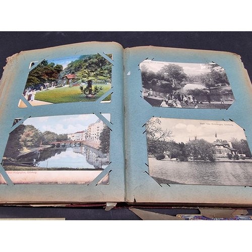 240 - POSTCARDS: a quantity, loose in bundle and in 4to album: together with a Victorian scrap album, box ... 