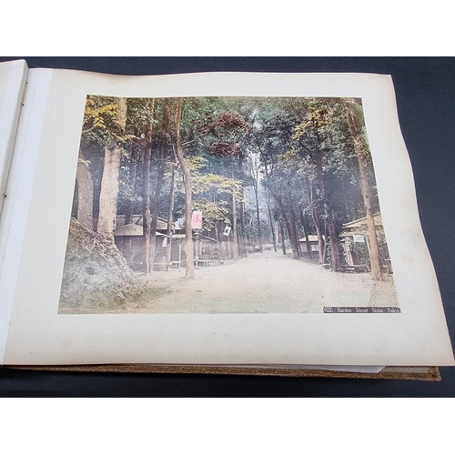 244 - PHOTOGRAPH ALBUM: JAPAN: album of 40 colour-tinted albumen print photographs of Japanese subjec... 