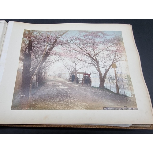 244 - PHOTOGRAPH ALBUM: JAPAN: album of 40 colour-tinted albumen print photographs of Japanese subjec... 