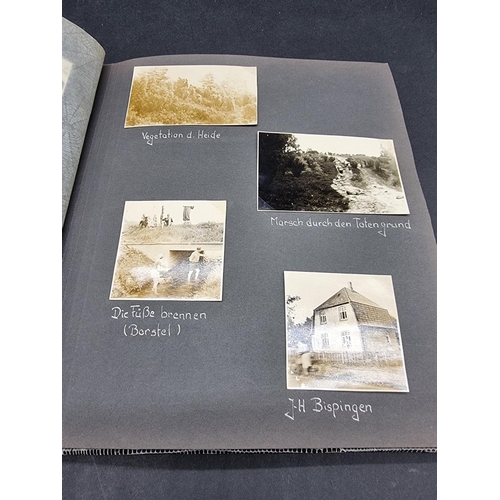 246 - A MIXED LOT: to include photograph albums, cigarette cards and stamps, plus a manuscript bill for ca... 