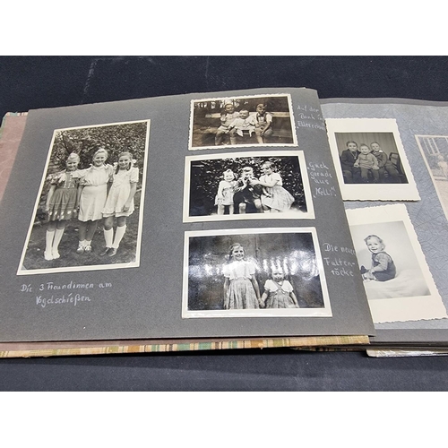 246 - A MIXED LOT: to include photograph albums, cigarette cards and stamps, plus a manuscript bill for ca... 