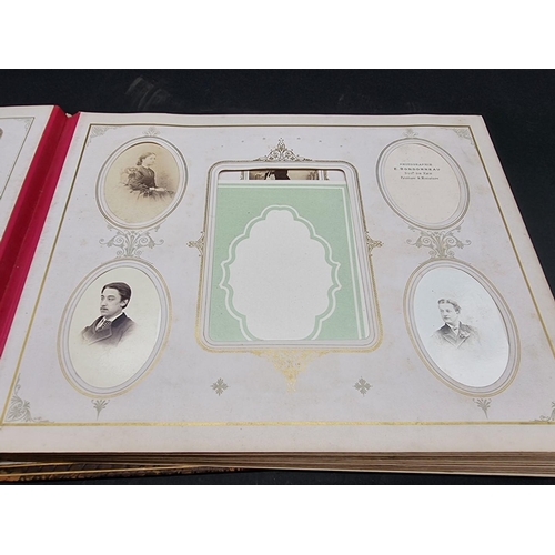 36 - CARTE DE VISITE ALBUM: a mid-Victorian album containing numerous window mounted cdv & cabinet ca... 