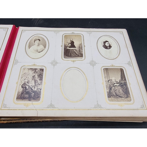 36 - CARTE DE VISITE ALBUM: a mid-Victorian album containing numerous window mounted cdv & cabinet ca... 