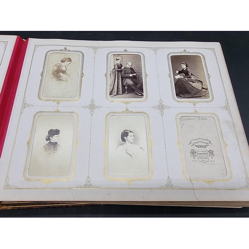 36 - CARTE DE VISITE ALBUM: a mid-Victorian album containing numerous window mounted cdv & cabinet ca... 