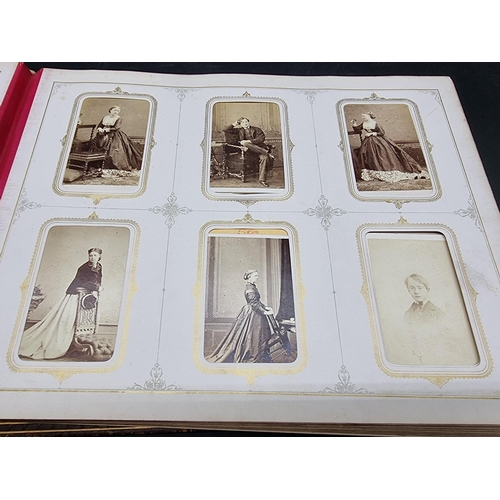 36 - CARTE DE VISITE ALBUM: a mid-Victorian album containing numerous window mounted cdv & cabinet ca... 