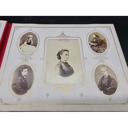 36 - CARTE DE VISITE ALBUM: a mid-Victorian album containing numerous window mounted cdv & cabinet ca... 