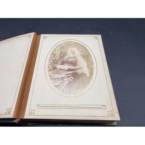 36 - CARTE DE VISITE ALBUM: a mid-Victorian album containing numerous window mounted cdv & cabinet ca... 