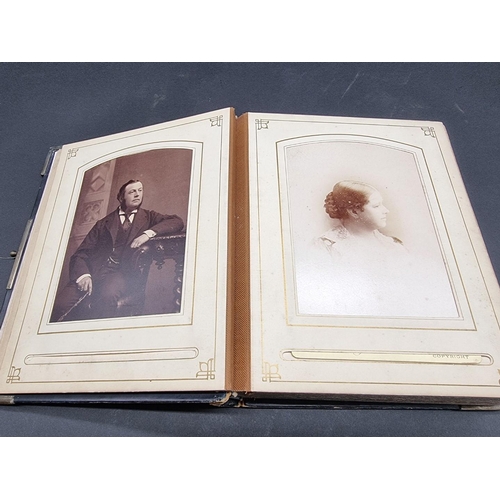 36 - CARTE DE VISITE ALBUM: a mid-Victorian album containing numerous window mounted cdv & cabinet ca... 