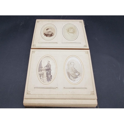 36 - CARTE DE VISITE ALBUM: a mid-Victorian album containing numerous window mounted cdv & cabinet ca... 